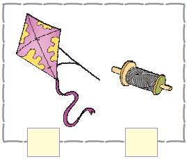 There is a kite and a roll of thread.