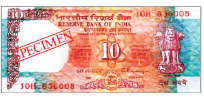 A ten rupee note, it is rectangular in shape. It has picture our national emblem and in the middle, number ten is written.