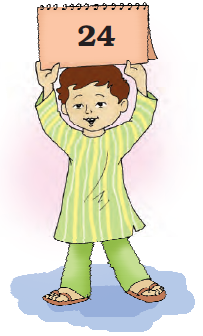 A boy is  holding a card in his hand, on which the digits two and four are written together.