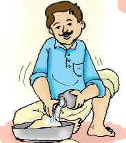 आदमी आटे में पानी मिला रहा है। 