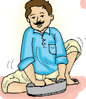 आदमी आटा गूंथ रहा है। 