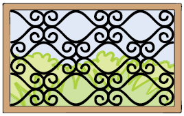 A pattern made by some curves and barfi shape in the window of a house.