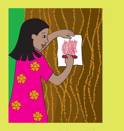 A girl has kept a white sheet of paper on the trunk of a tree and is rubbing a crayon on it. 