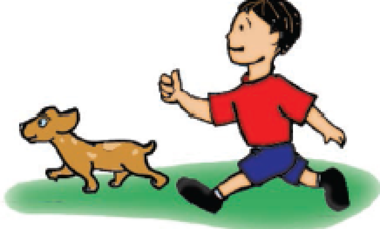 A boy running after a puppy.