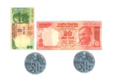 A twenty rupee and a five rupee note with two coins of 50 paise each.