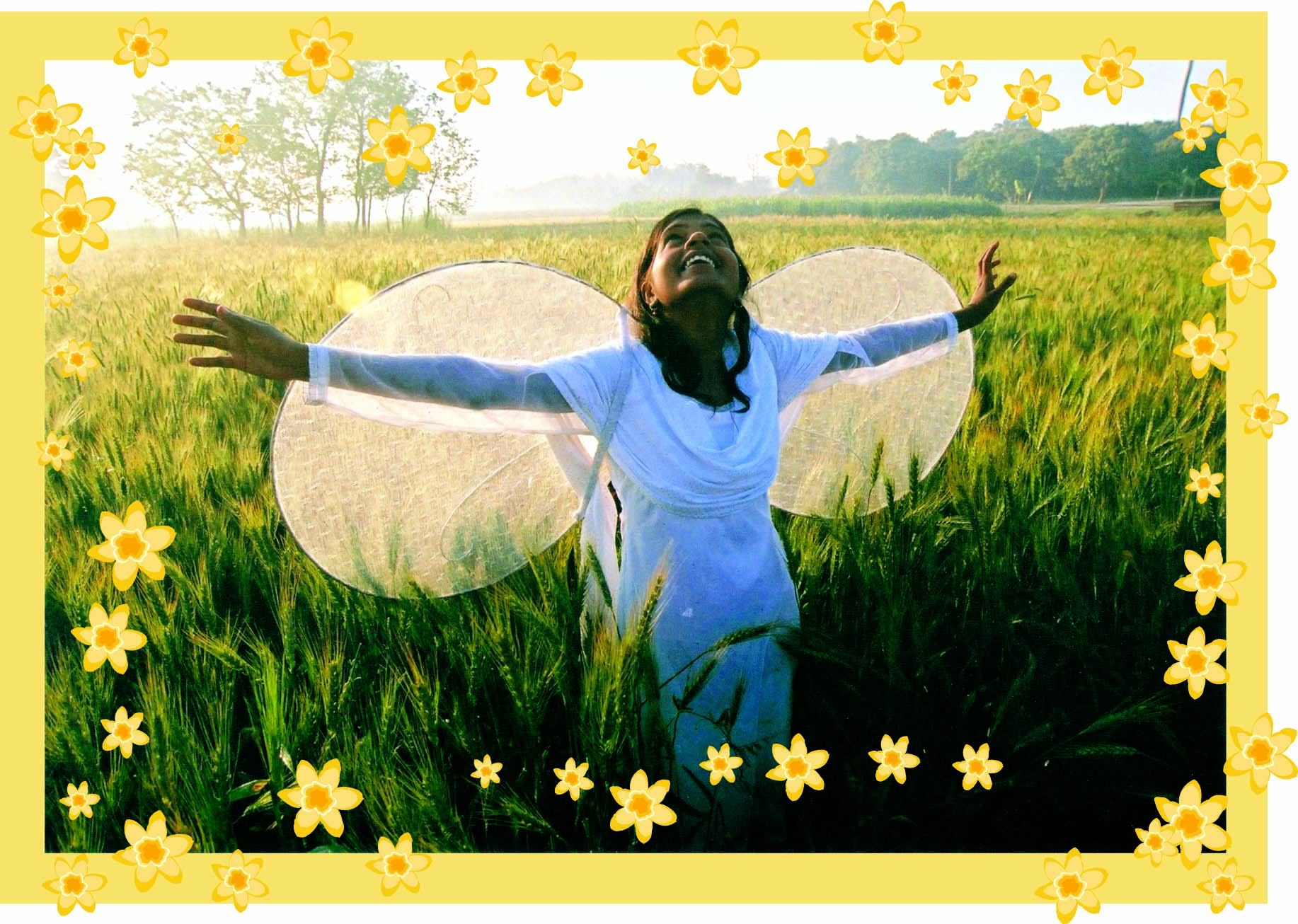 A girl with covered face standing in a field.