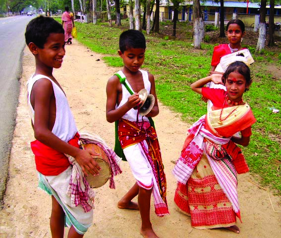 Boys and girls performing festival dance. 