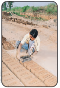 Image B- A man is taking out the brick from stencil.