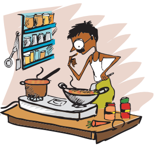 A man cooking food in the kitchen. 