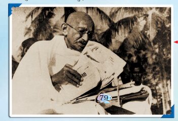 गांधी जी पत्र पढ़ रहे हैं