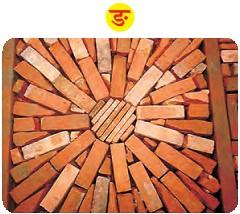 चित्र 'ड़' में ईंट से बनाया हुआ पैटर्न है।