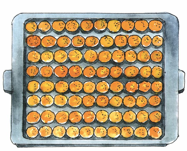 80 लड्डुओं  की ट्रे रखी है। 