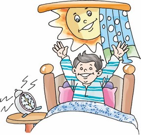 The sun is shining brightly outside and a child has woken up on his bed.