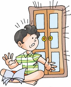 A boy is sitting on the floor and reading a book and he is surprised to hear the doorbell.