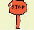 A sign board on which stop is written.