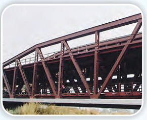 A bridge with triangular shaped patterns formed by rods on both the sides.