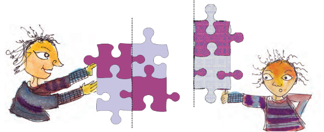 Two girls holding a pattern in their hands.