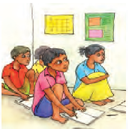 कुछ बच्चे कक्षा में फर्श पर बैठकर पढ़ रहे हैं। 