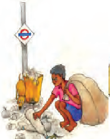 सड़क से कचरा उठाता बच्चा। 