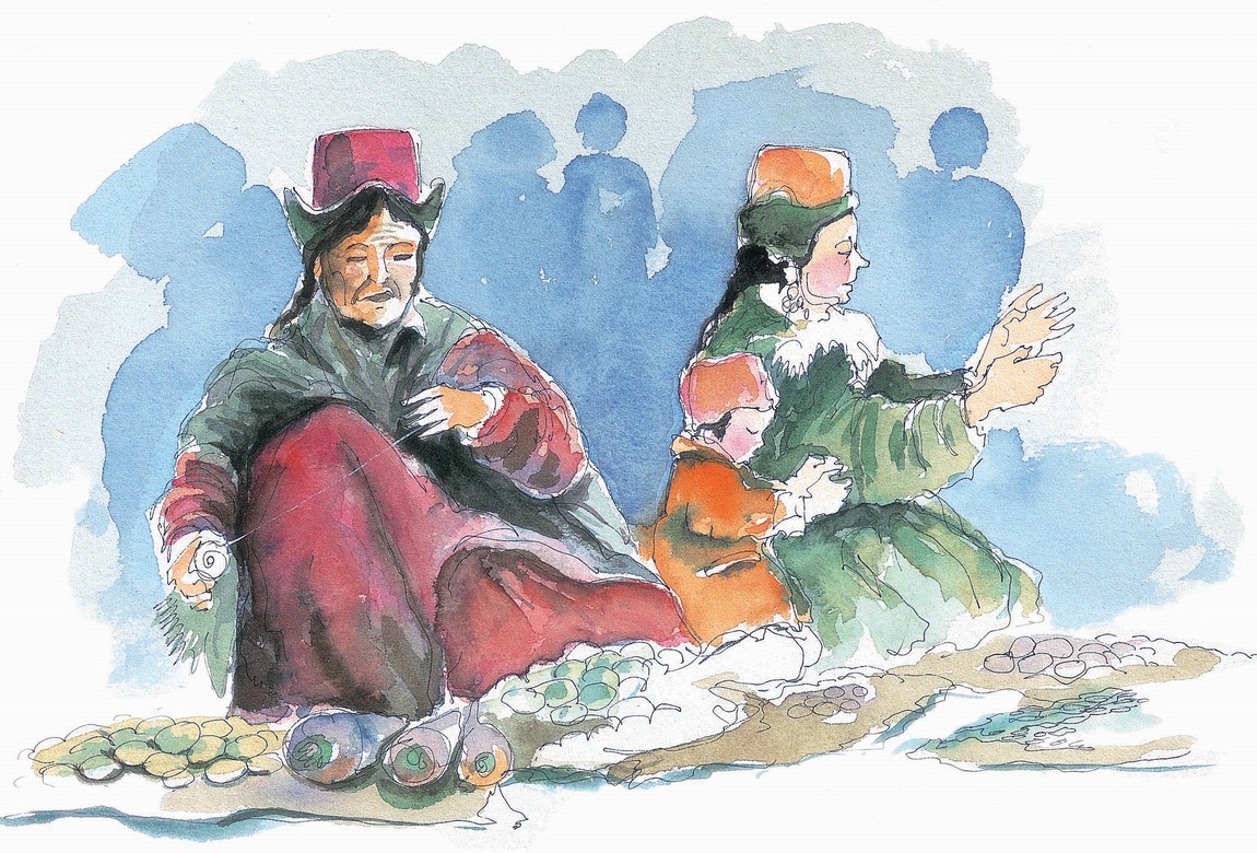 एक आदमी और एक औरत के साथ एक छोटा बच्चा बैठा है।