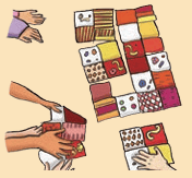 Hands holding fabric scraps