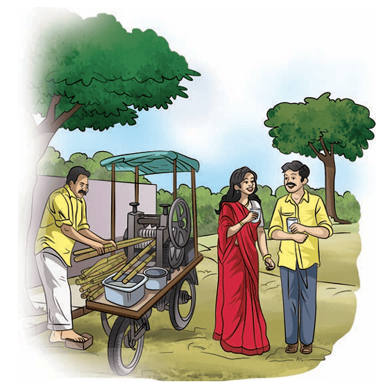Vendor making sugarcane juice for a couple