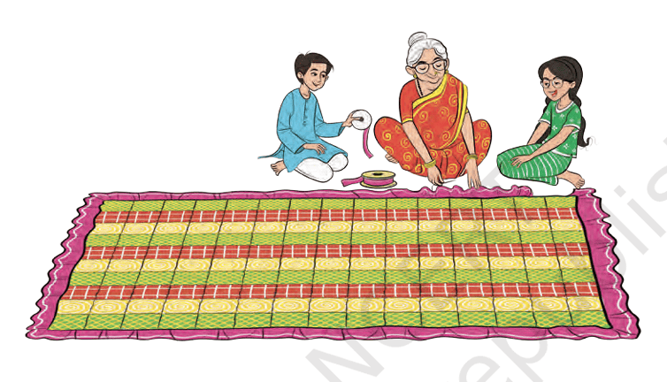 Grandmother making a quilt with two children