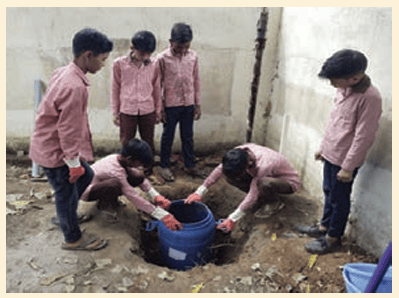 Students making a soakpit