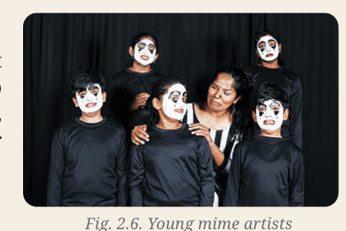Young mime artists performing