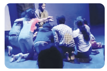 A group of students performing together on stage