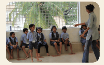 Young children participating in a workshop activity